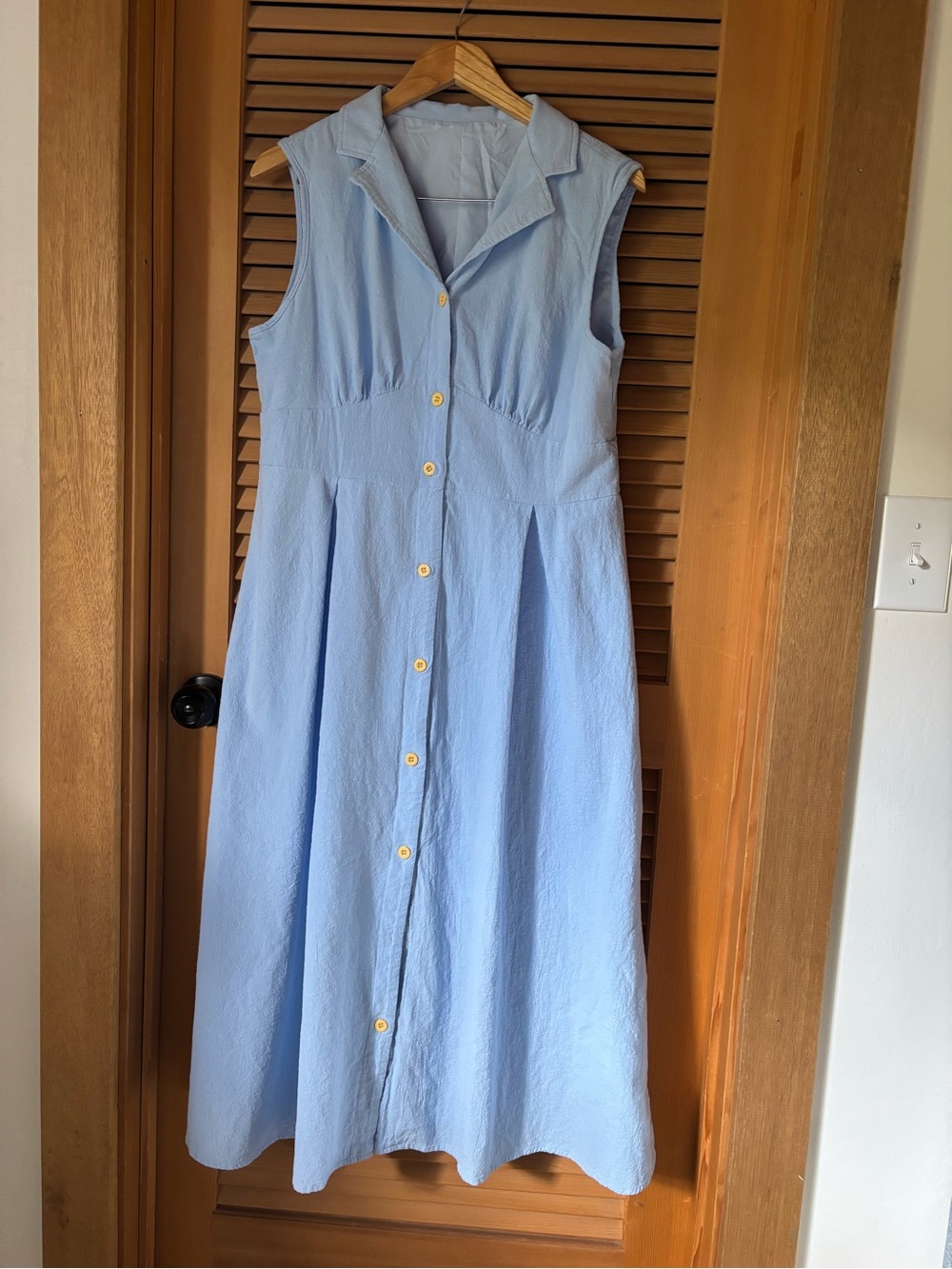 Sleeveless Light Blue Button-Front Midi Dress